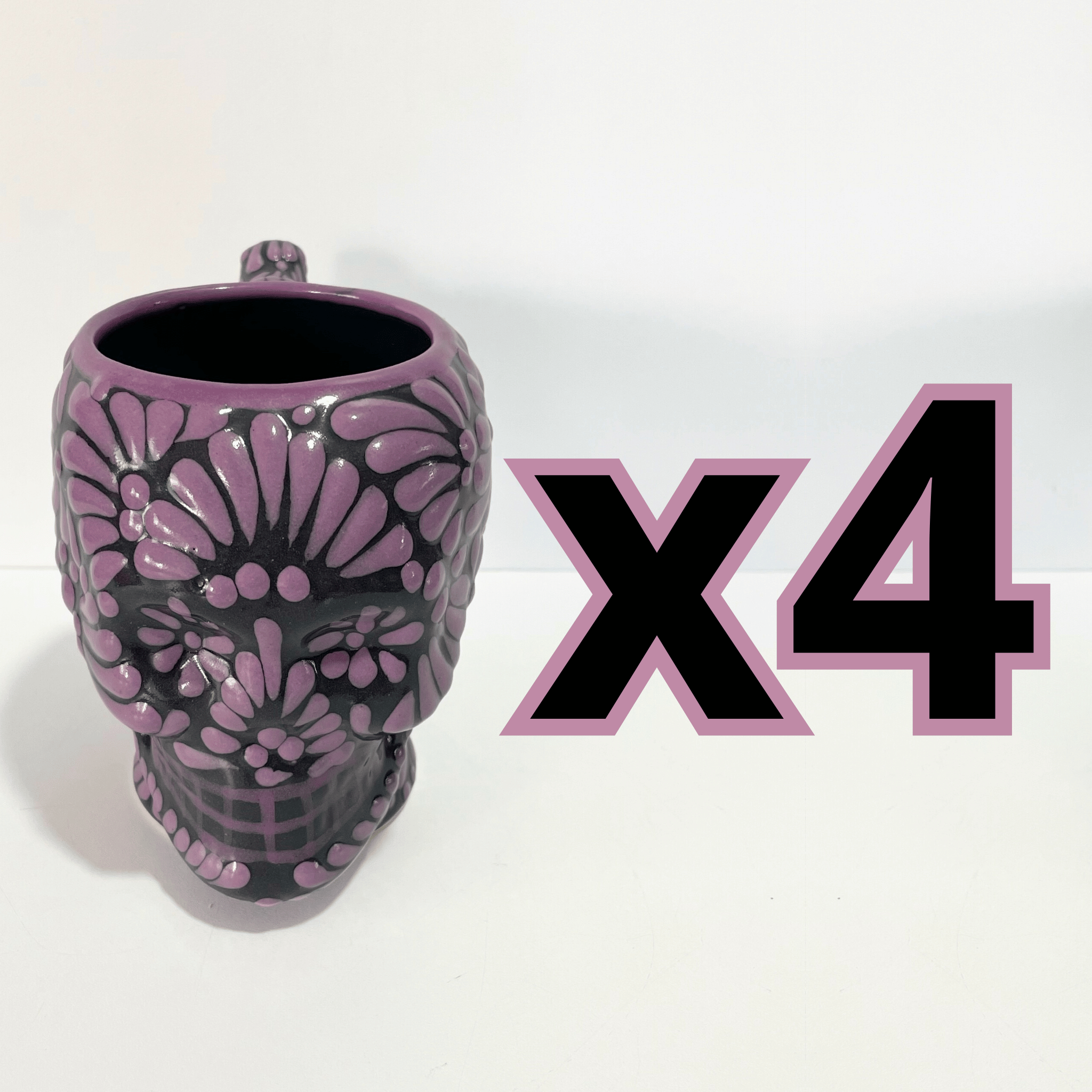 TAZA FORMA DE CRANEO FONDO NEGRO MIK MORADO