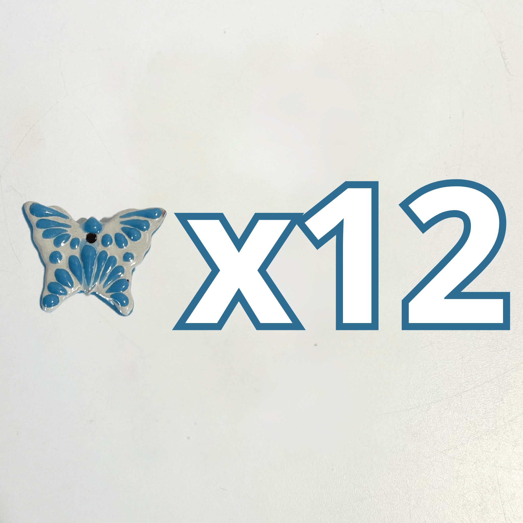 MARIPOSA 4.2 CM FONDO TRADICIONAL DECORADO AZUL TURQUESA