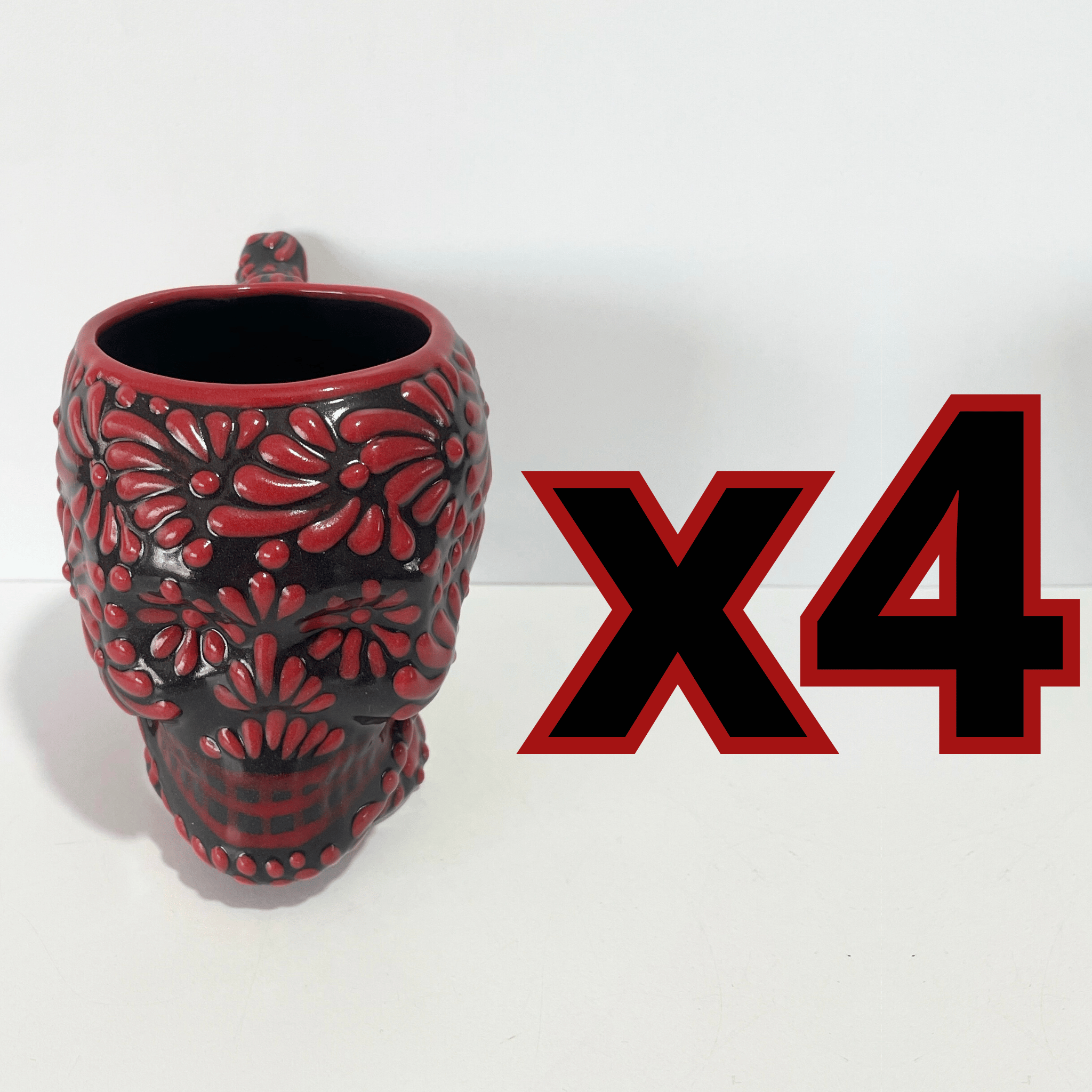 TAZA FORMA DE CRANEO FONDO NEGRO MIK ROJO