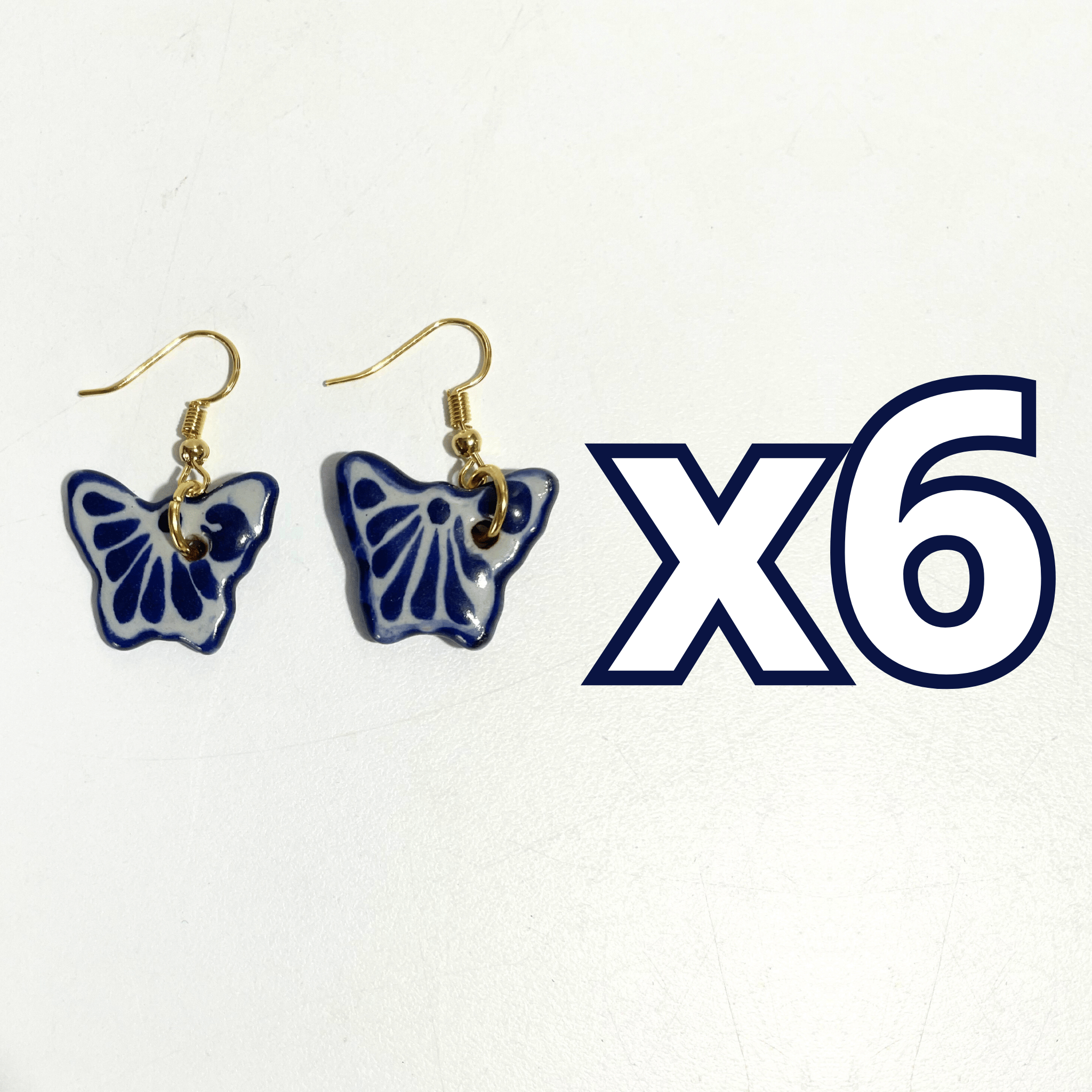 ARETES MARIPOSA FONDO TRADICIONAL DECORADO AZUL COBALTO