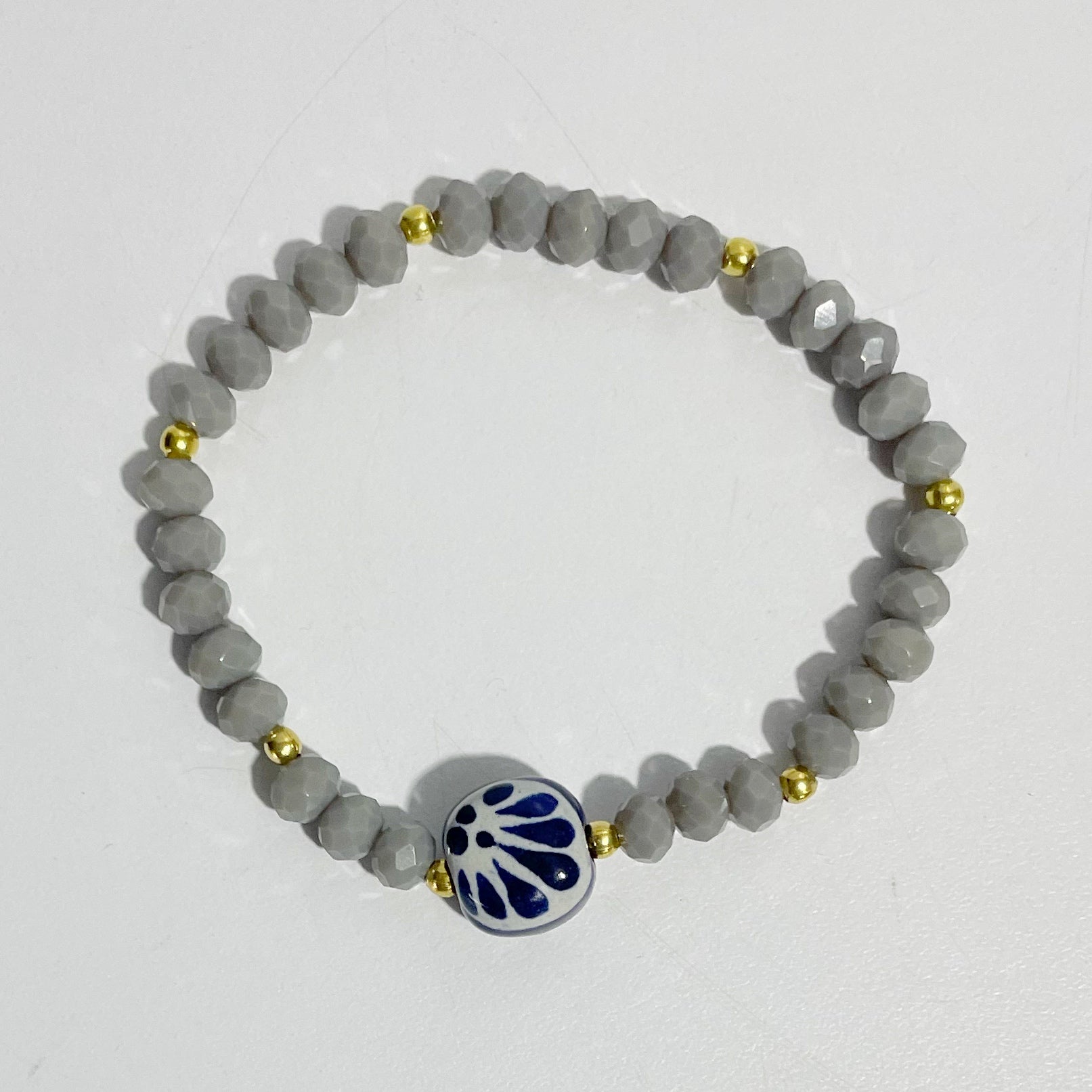 PULSERA CRISTAL CORTADO GRIS CIRCULO FONDO TRADICIONAL DECORADO AZUL COBALTO